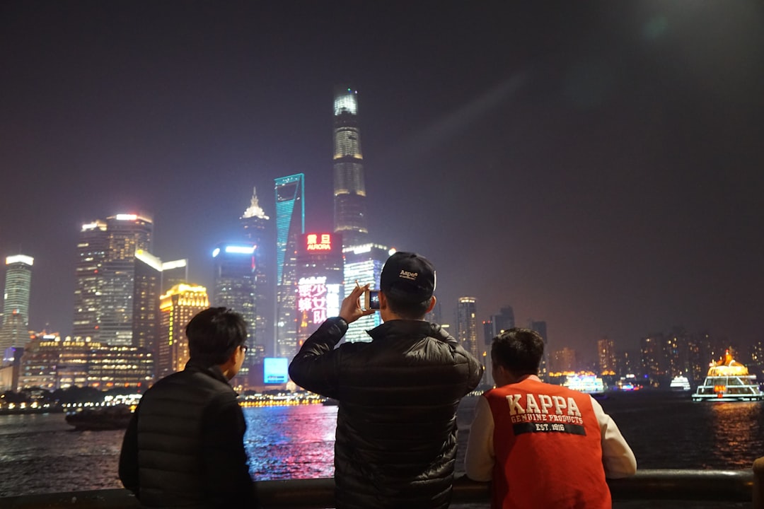 Chinese tech workers are starting to train their AI doubles–and pushing back